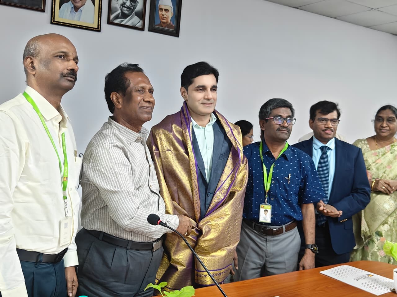 Dr. Raghu Vamsi receiving medical recognition